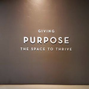 "Giving Purpose The Space To Thrive" Message Interior Signage